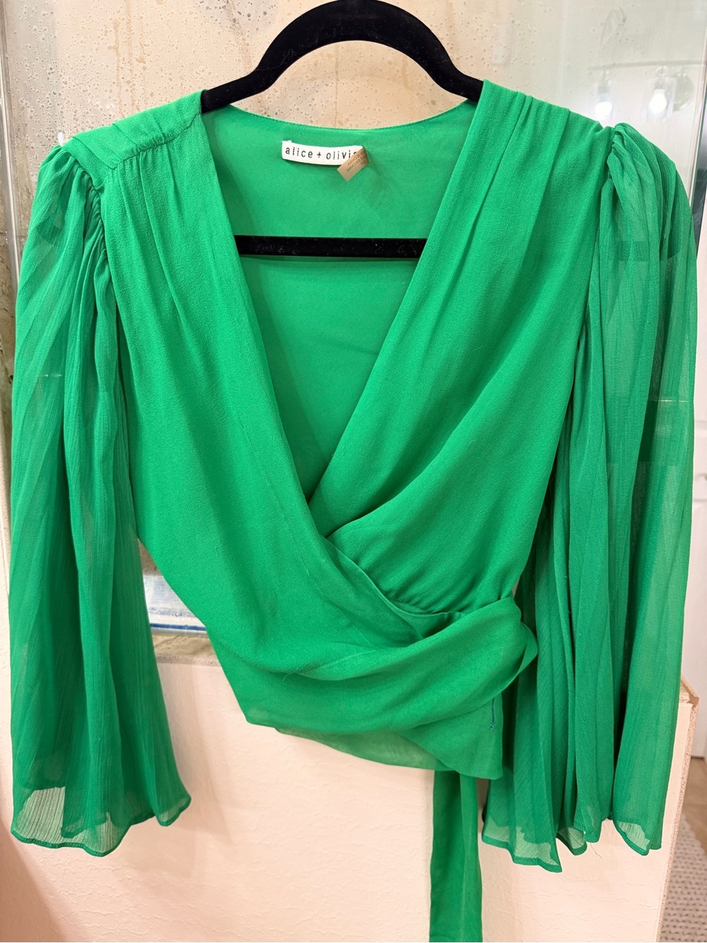 Alice + Olivia emerald green wrap blouse with sheer puff sleeves